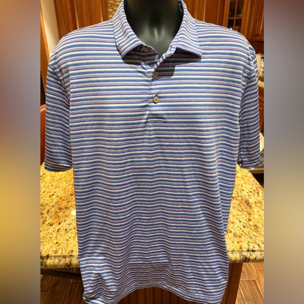 Peter Millar men’s summer comfort men’s golf polo. Sharp blue/purple/white strip